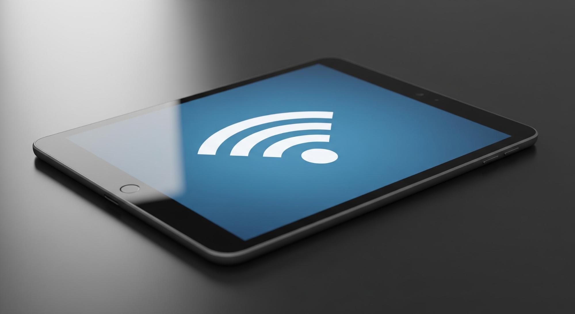 Illustration d'une tablette numérique avec une icône de connexion Wi-Fi sur l'écran